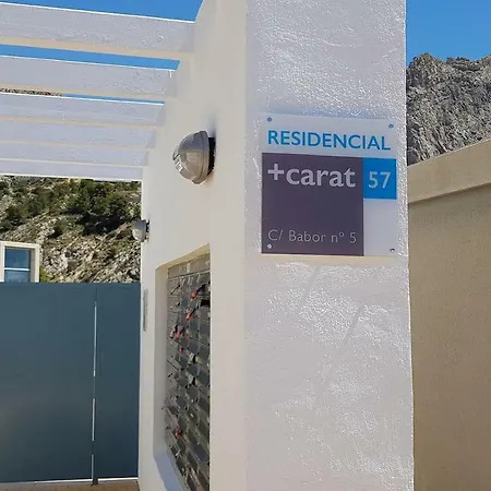 Carat *